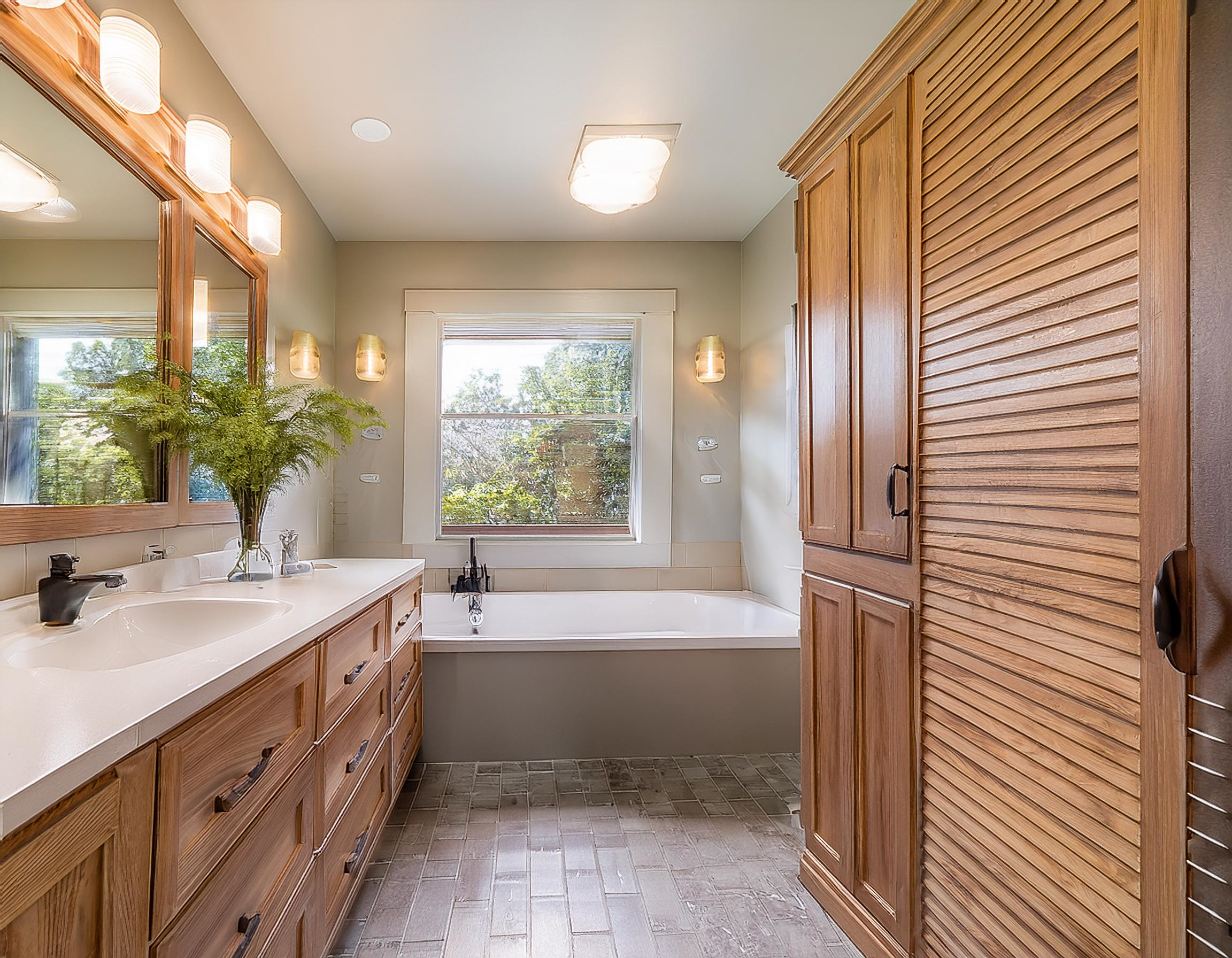 firefly a renovated bathroom showcasing custom cabinetry designed for maximizing storage in limited